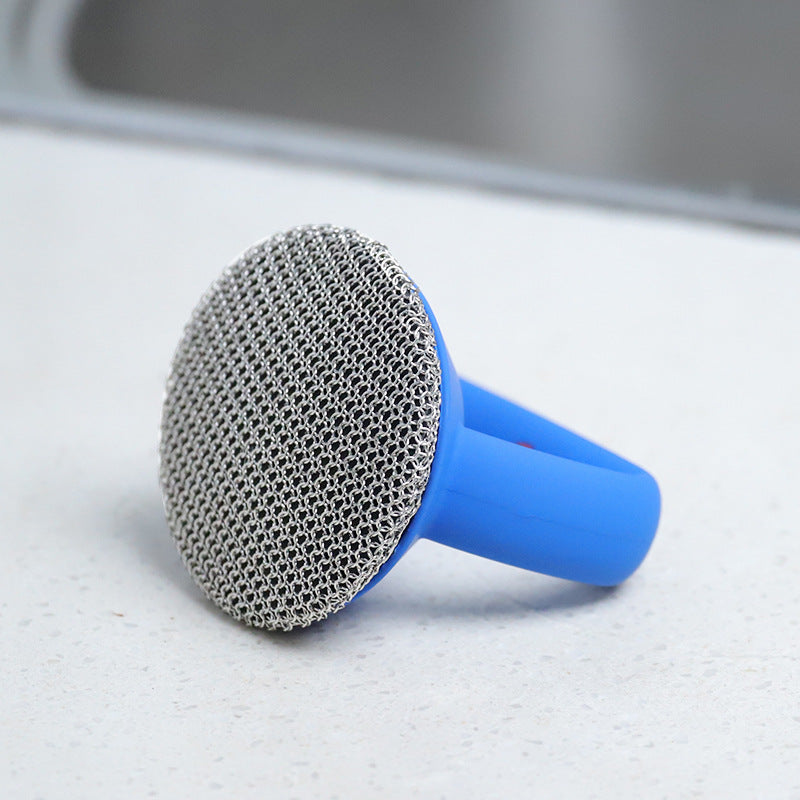 316 Stainless Steel Cast Iron Scrubber with Handle on a countertop, featuring a blue handle and a metallic scrubbing surface.